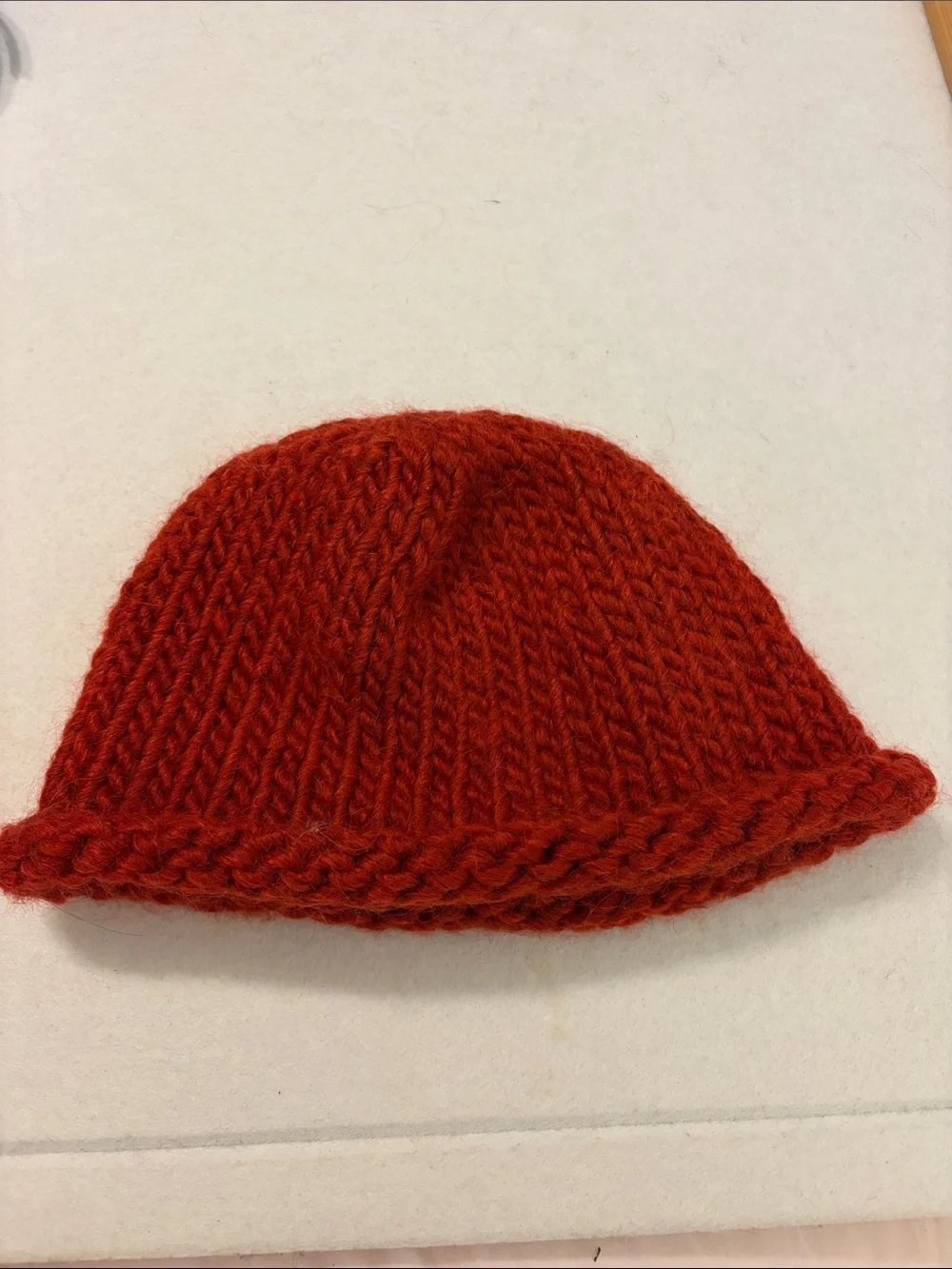 Handmade red beanie with metal buttons